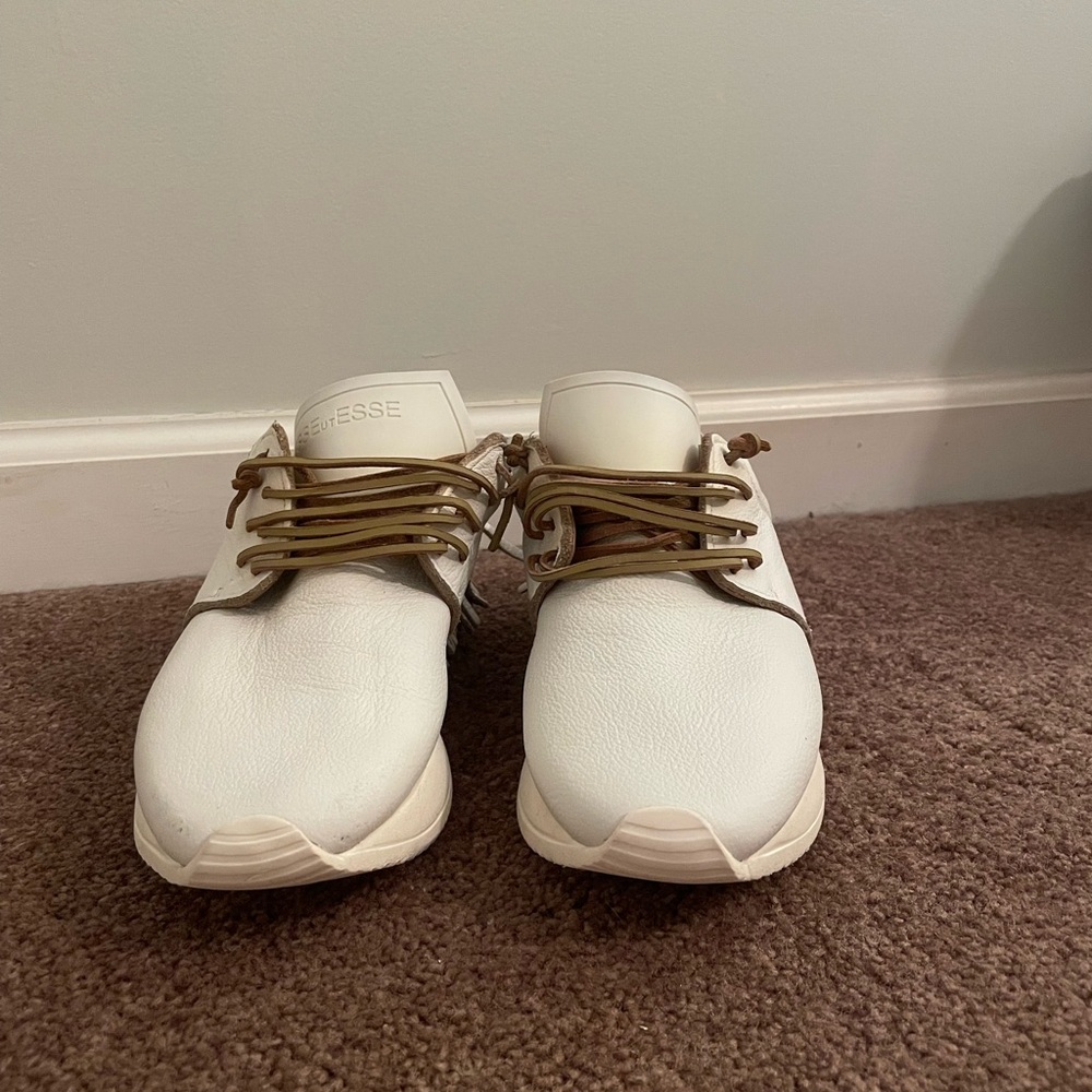 White Esseutesse fringe sneakers